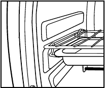 Oster - TSSTTVSK01 - Placering af panden til grillning eller broiling Placering af panden til grillning eller broiling