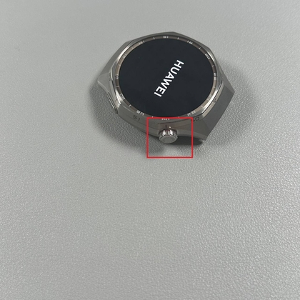 Turn on Huawei Watch GT 6 Pro by holding the crown button