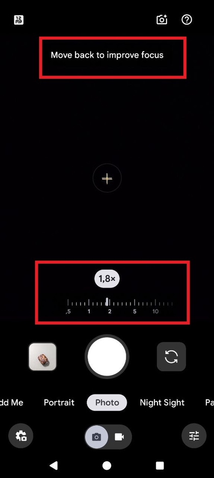 Screenshot af kamera-appens sk&aelig;rm, der viser zoomskyderen eller zoomniveauknapperne, der justeres.
