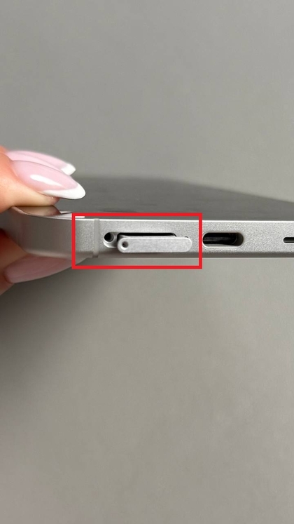 Inserting the tray back into the Samsung Galaxy S25 FE