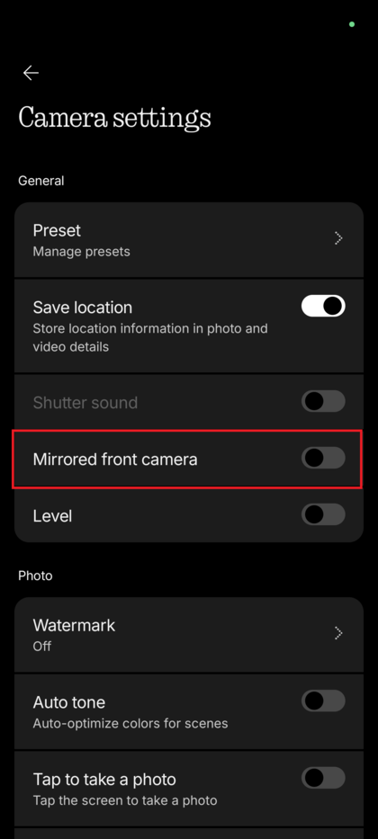 The Camera More Settings screen showing the Mirrored front camera option with the toggle switch in the OFF position.