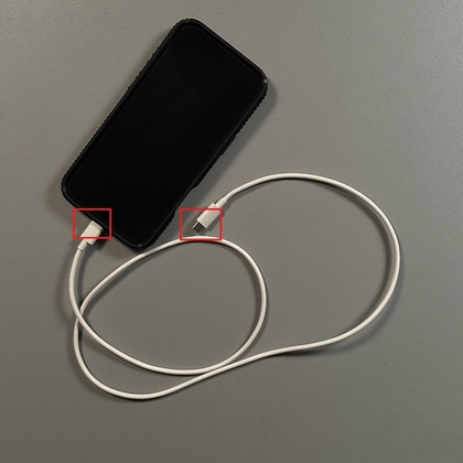 USB-C cable connected to a phone