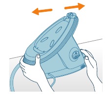 Przytrzymaj i potrząśnij podstawą urządzenia